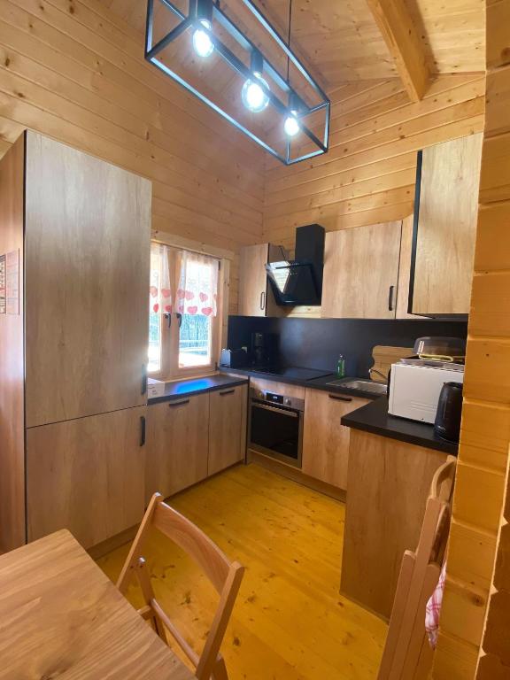 Kuchyň nebo kuchyňský kout v ubytování Les Chalets Du Marais