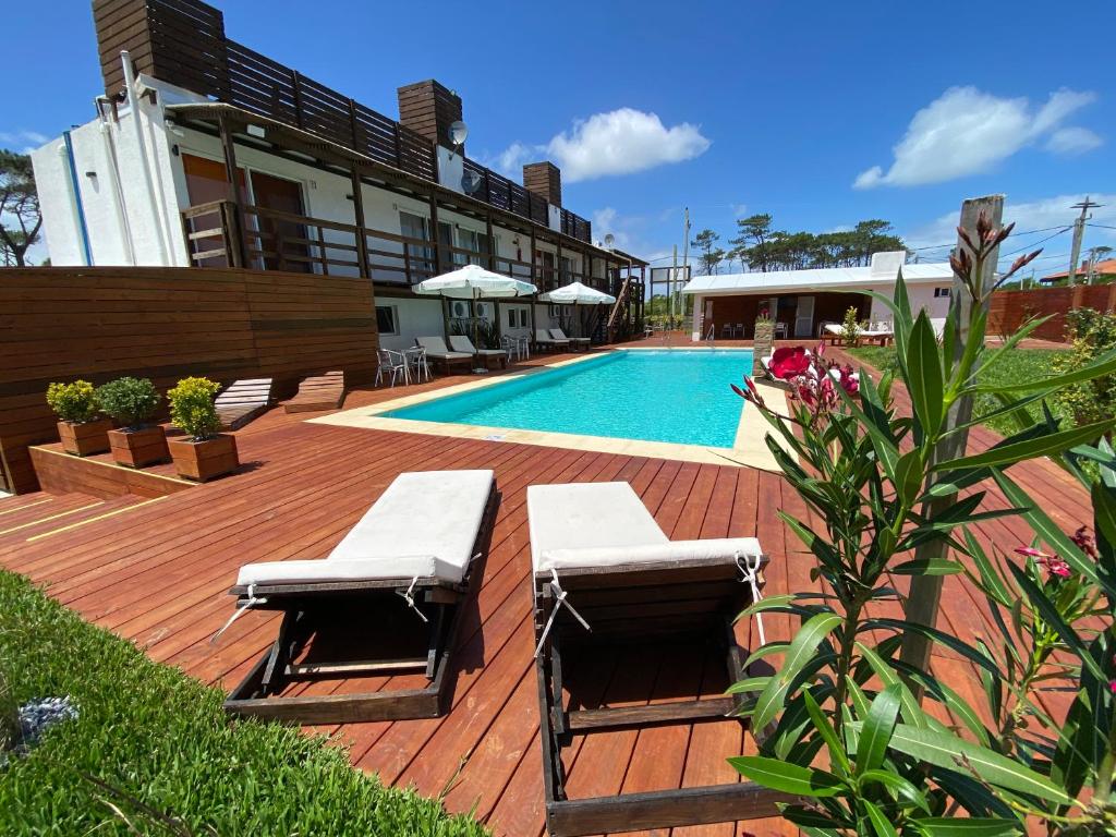 A piscina localizada em Hotel MANDALA BEACH CHIHUAHUA Naturista Nudista Opcional -Exclusivo Adultos- ou nos arredores