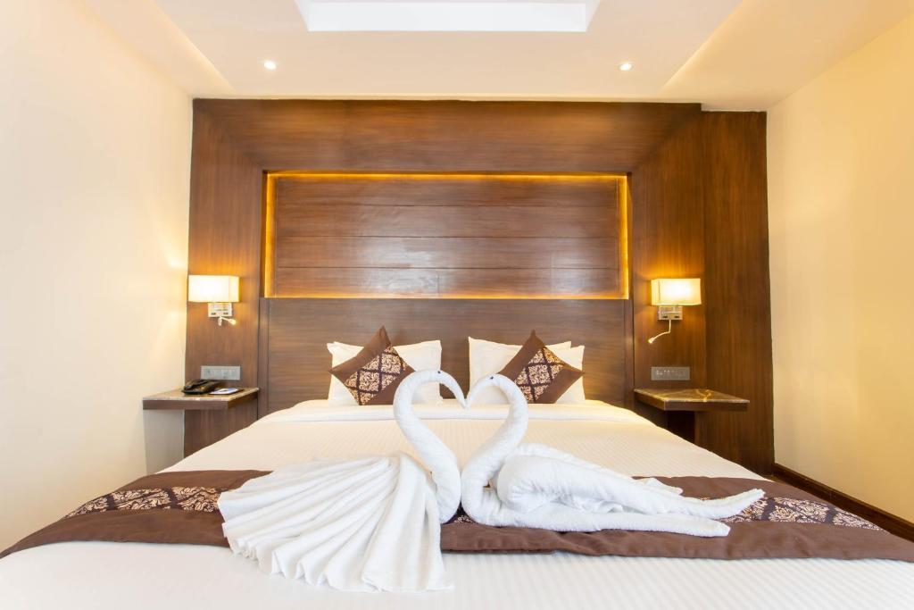 Postel nebo postele na pokoji v ubytování Hotel Da Flamingo