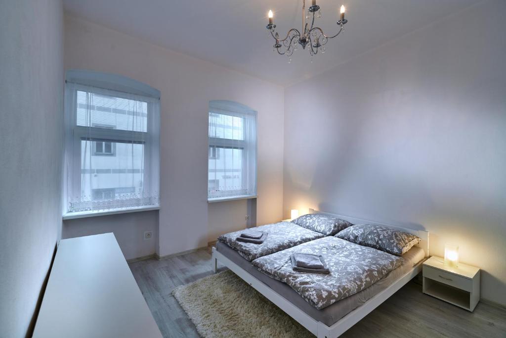 Posteľ alebo postele v izbe v ubytovaní Apartmán BB centrum