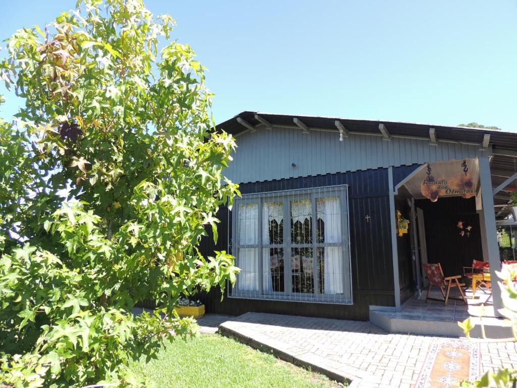  Recanto dos Oliveiras Hospedada por Dick e Clair