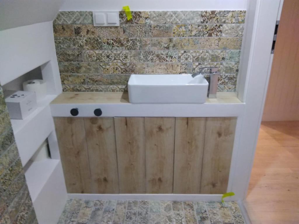 Kúpeľňa v ubytovaní STUDIO SLOW CERLA 9 Korbielów