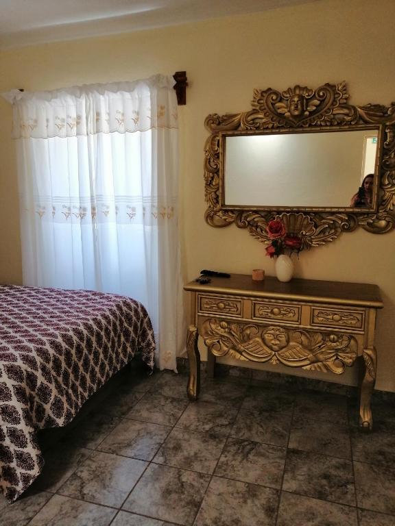 Postel nebo postele na pokoji v ubytování Hotel Chely