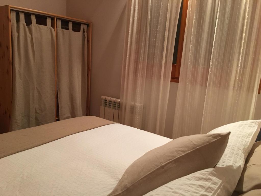 Postel nebo postele na pokoji v ubytování Apartaments Cal Borda
