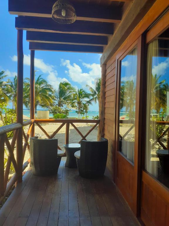 Balkón nebo terasa v ubytování Palmeras de Mahahual Cabañas