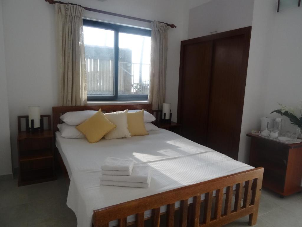 Postel nebo postele na pokoji v ubytování Amssler Beach Stay