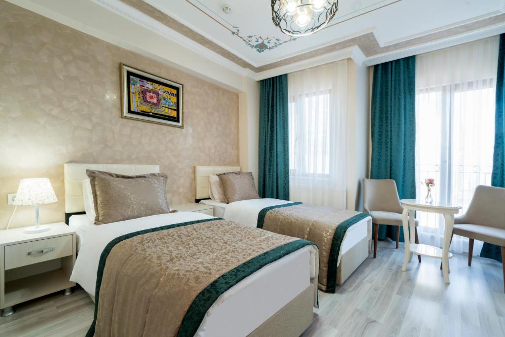 Atam Suites - Habitación Triple Superior Con Vistas Al Mar