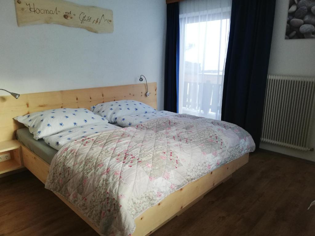 Postel nebo postele na pokoji v ubytování Silzerhof