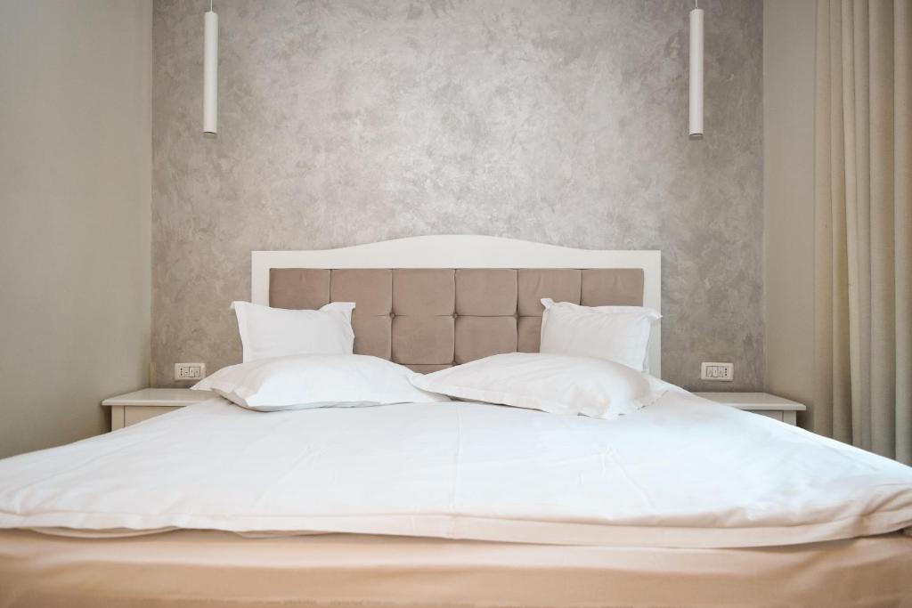 Postel nebo postele na pokoji v ubytování Camere de Inchiriat IGLOO