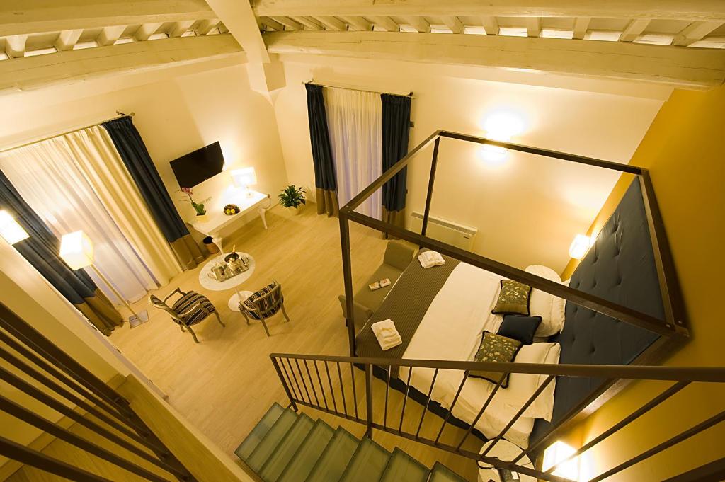TV a/nebo společenská místnost v ubytování Relais dell'Olmo