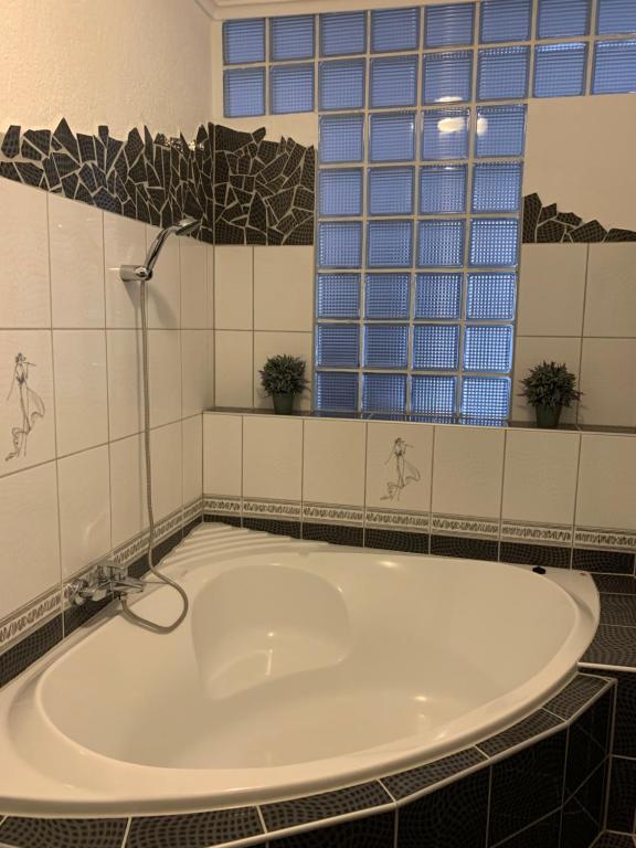 Kúpeľňa v ubytovaní Thermal Next II Weninger Apartman Kiskunhalas