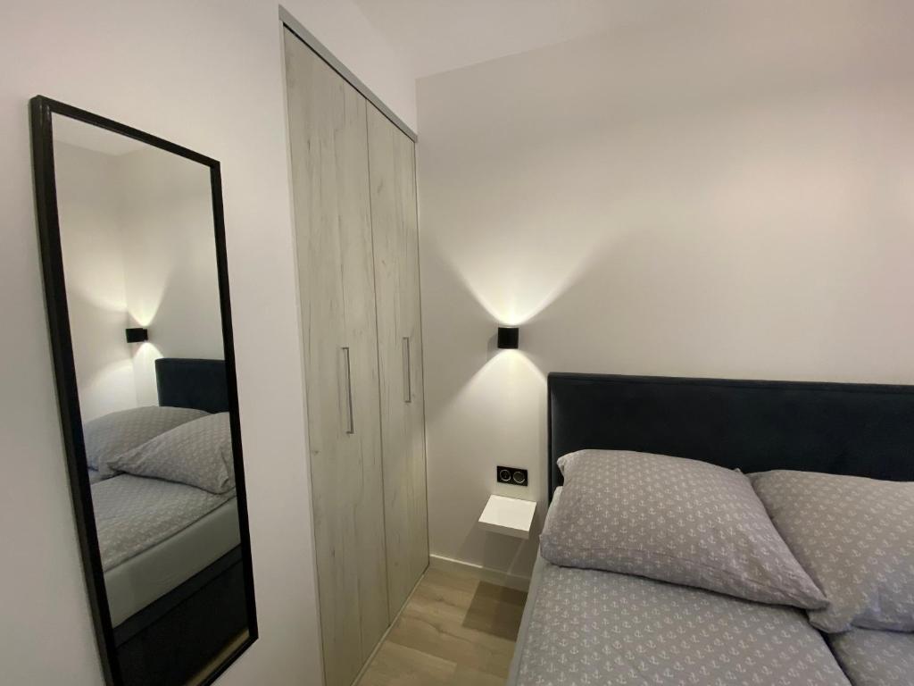 Posteľ alebo postele v izbe v ubytovaní Apartament Lenka