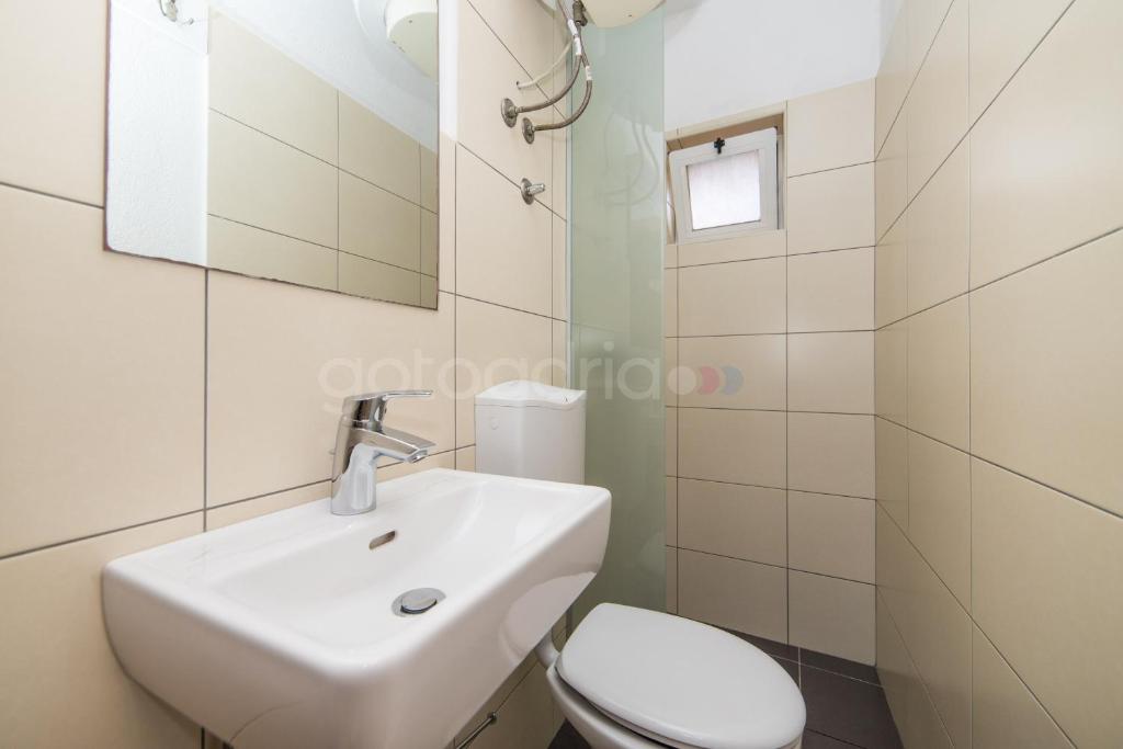 Kúpeľňa v ubytovaní City Central Apartments Dolore