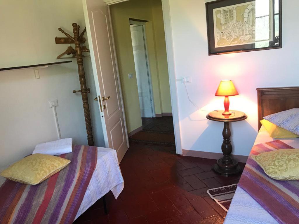 A bed or beds in a room at Nel Colle
