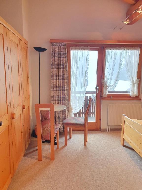 Posezení v ubytování Chalet Alba A