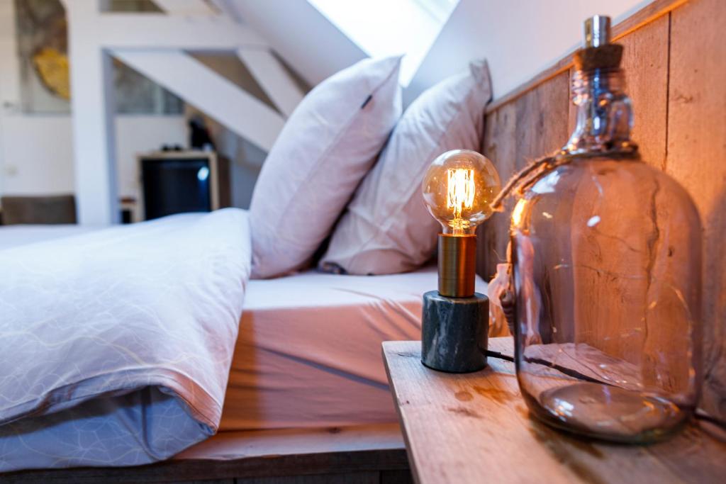 Postel nebo postele na pokoji v ubytování B&B 'T ZOUTE