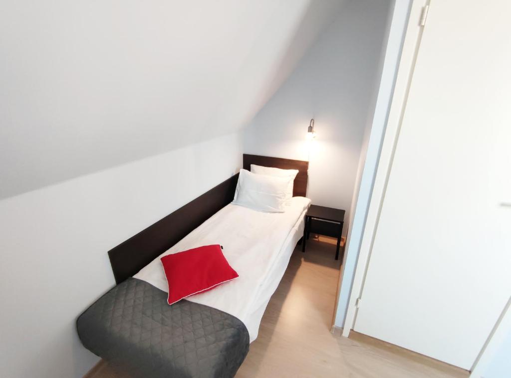 Postel nebo postele na pokoji v ubytování Aisa Guesthouse