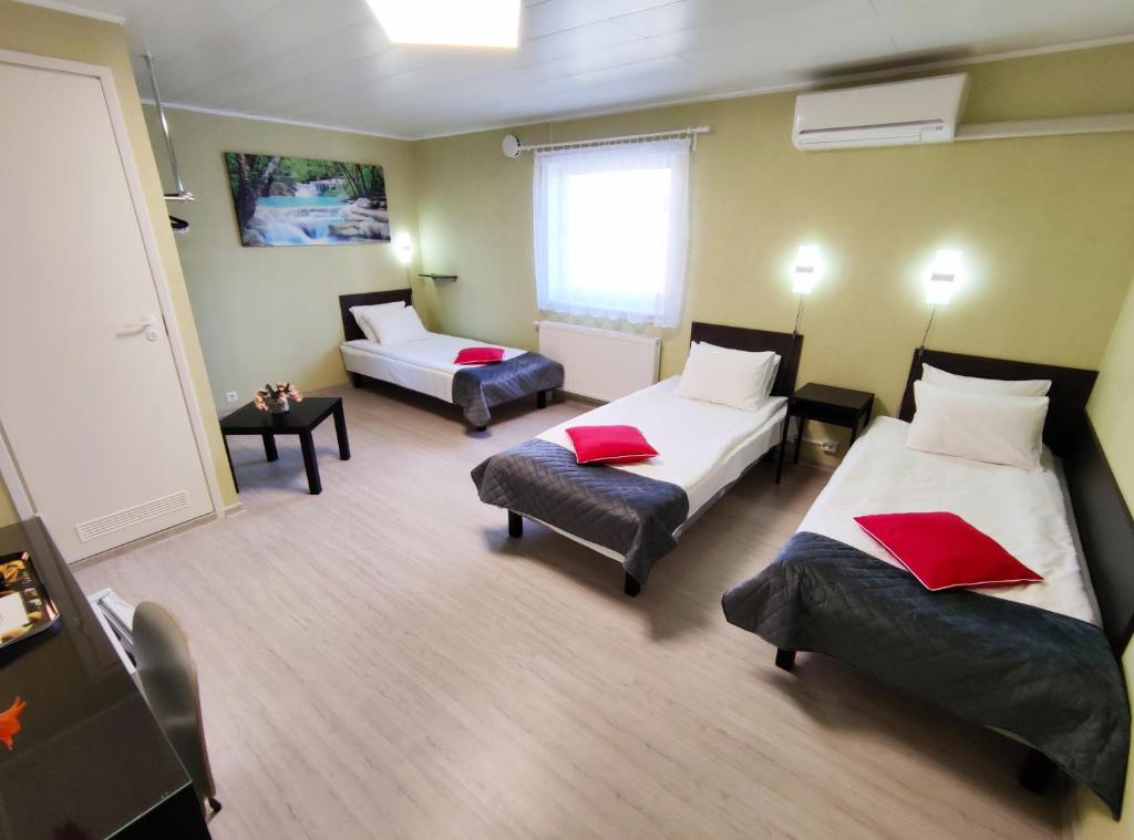 Postel nebo postele na pokoji v ubytování Aisa Guesthouse