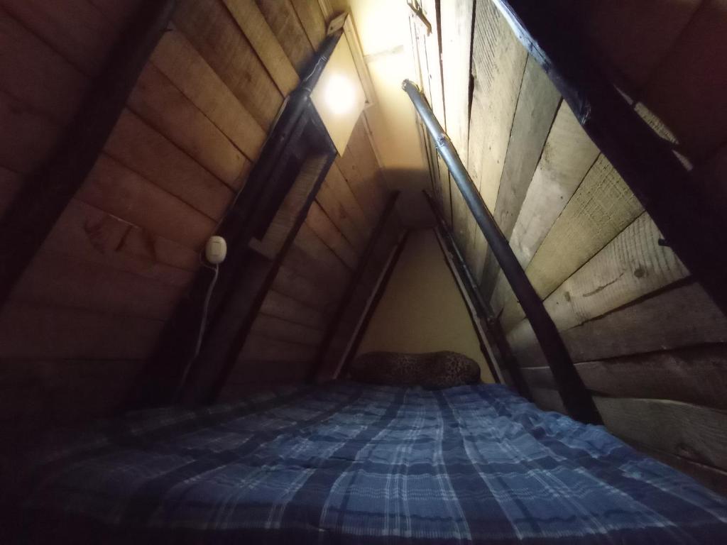 Postel nebo postele na pokoji v ubytování Cabañas el Paraiso Sesquile