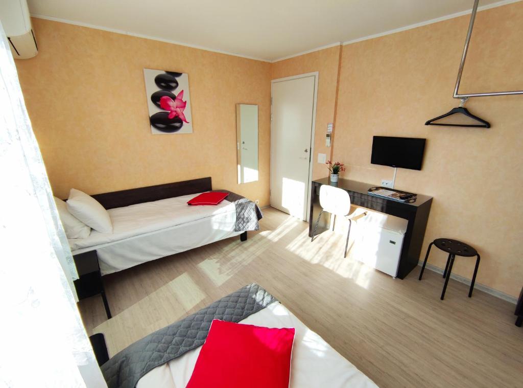 TV a/nebo společenská místnost v ubytování Aisa Guesthouse