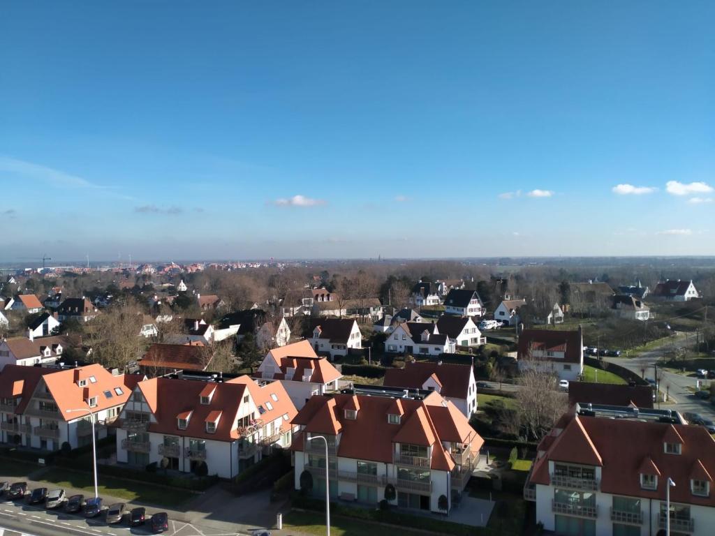an aerial view of a residential neighborhood with houses at Studio Penthouse Nieuwpoort in Nieuwpoort