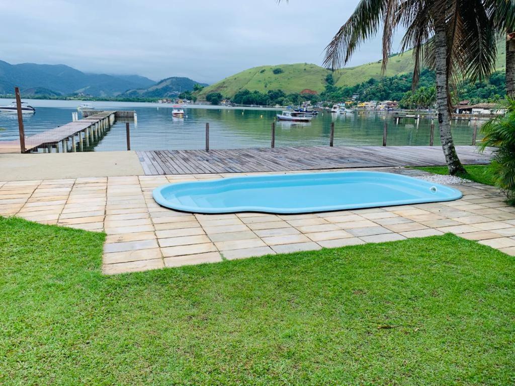  MAGNÍFICA CASA SALMÃO A BAIRA-MAR EM ANGRA.