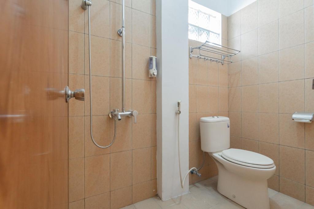 Koupelna v ubytování Lembur Kiwari Setra Duta Mitra RedDoorz