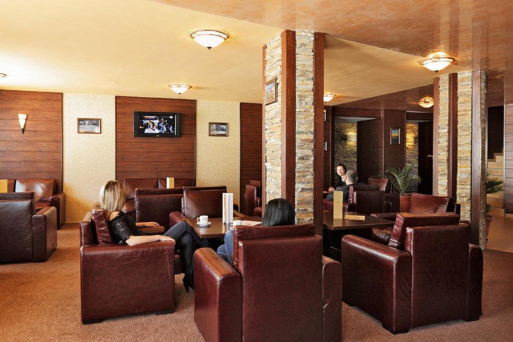 TV a/nebo společenská místnost v ubytování Forest Nook Aparthotel