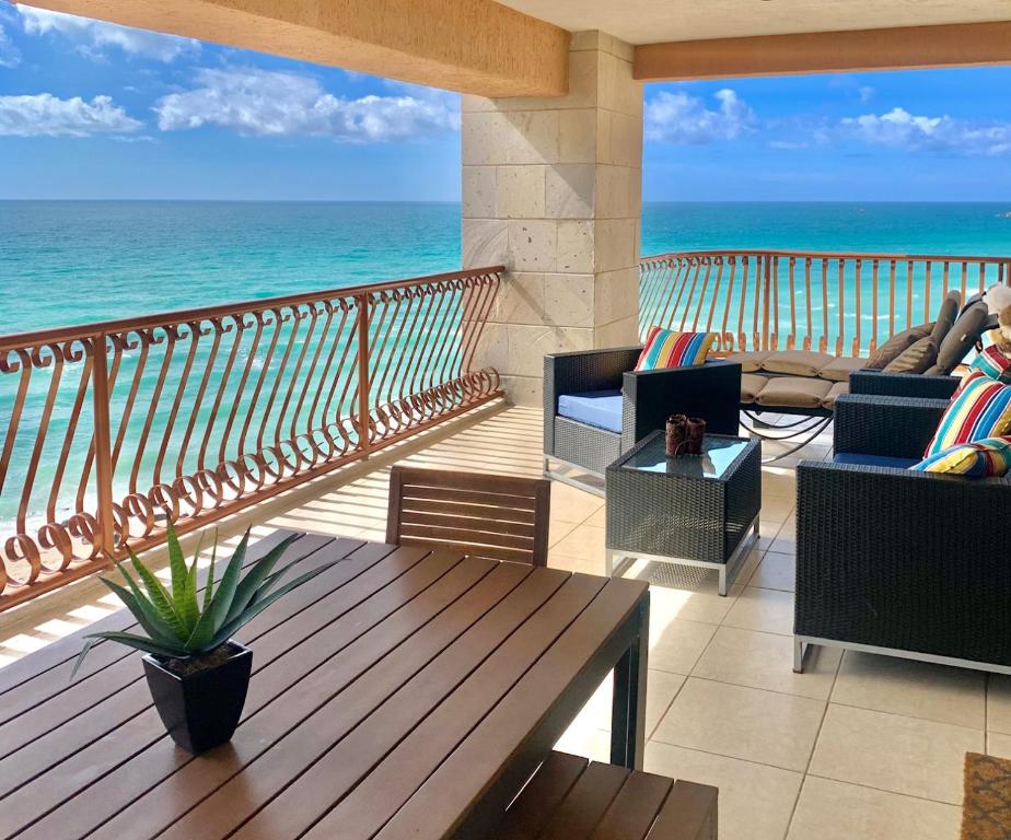 a balcony with a view of the ocean at Rocky Point Sonoran Resorts in Puerto Peñasco
