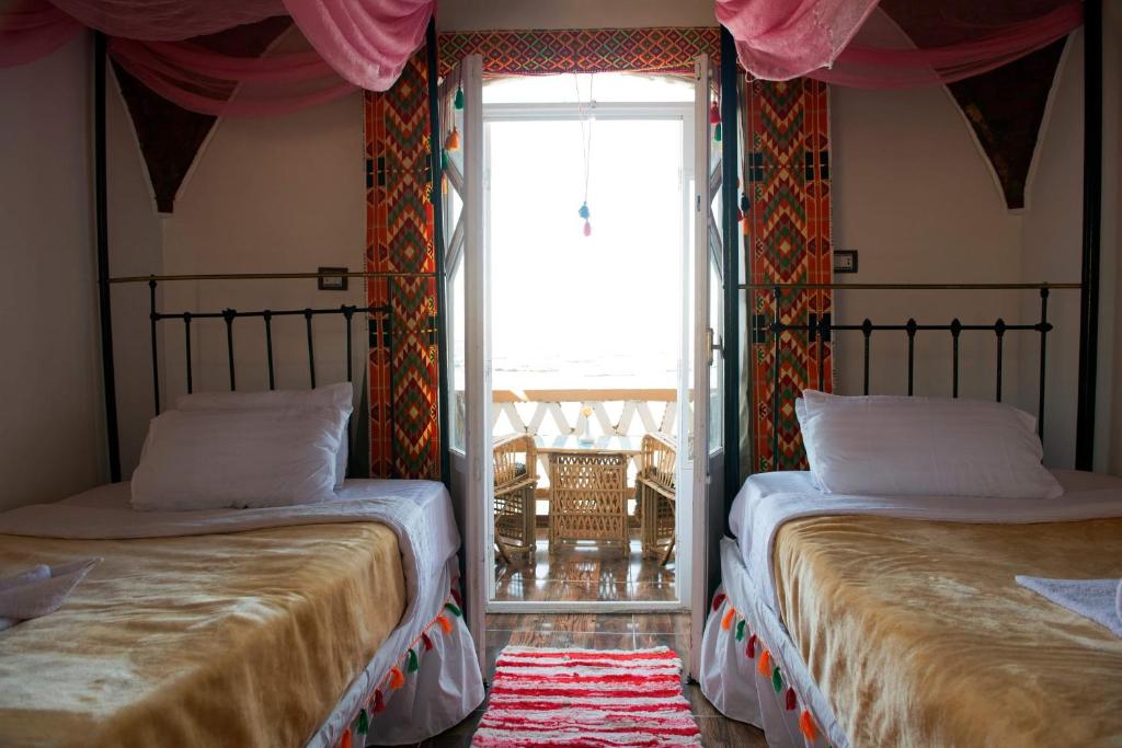Llit o llits en una habitació de Old Nubian guest house