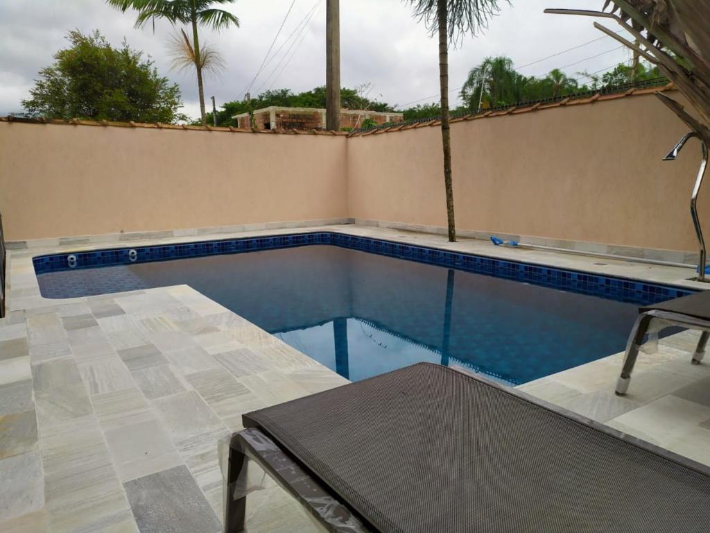  Casa em condomínio fechado em Camburizinho Litoral Norte com Piscina Privativa