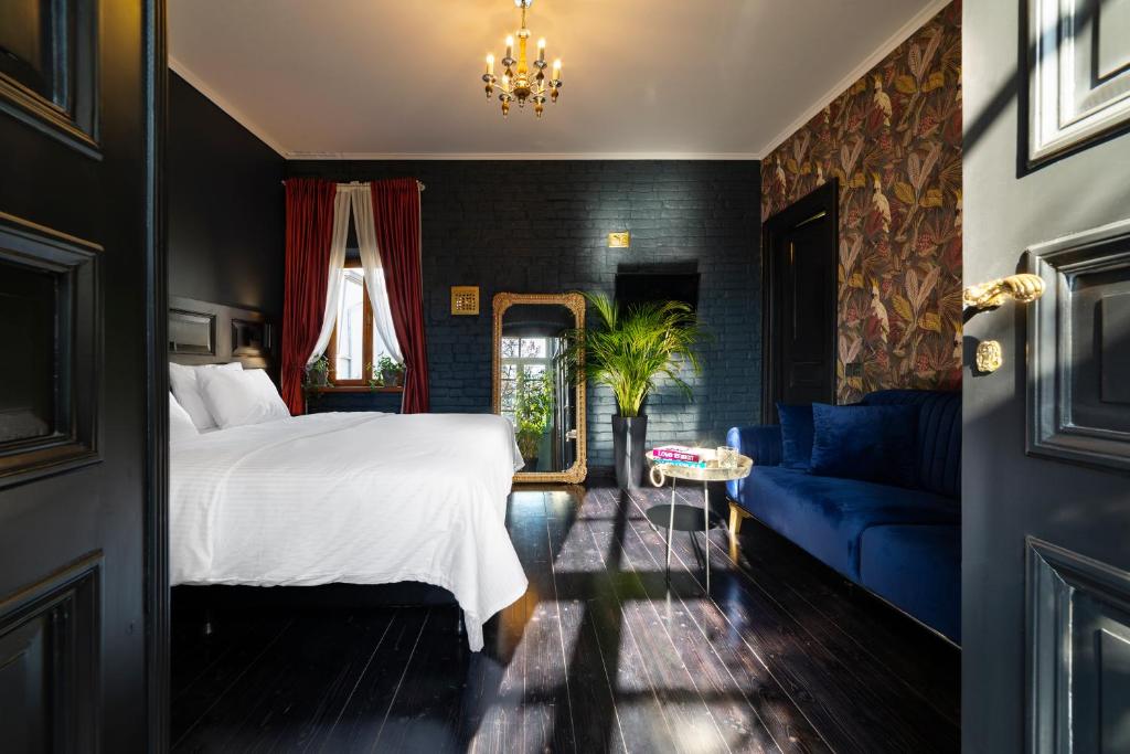 Postel nebo postele na pokoji v ubytování Unfound Door - Design Hotel