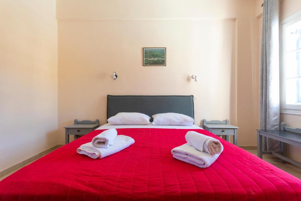 Postel nebo postele na pokoji v ubytování Vanas Apartments