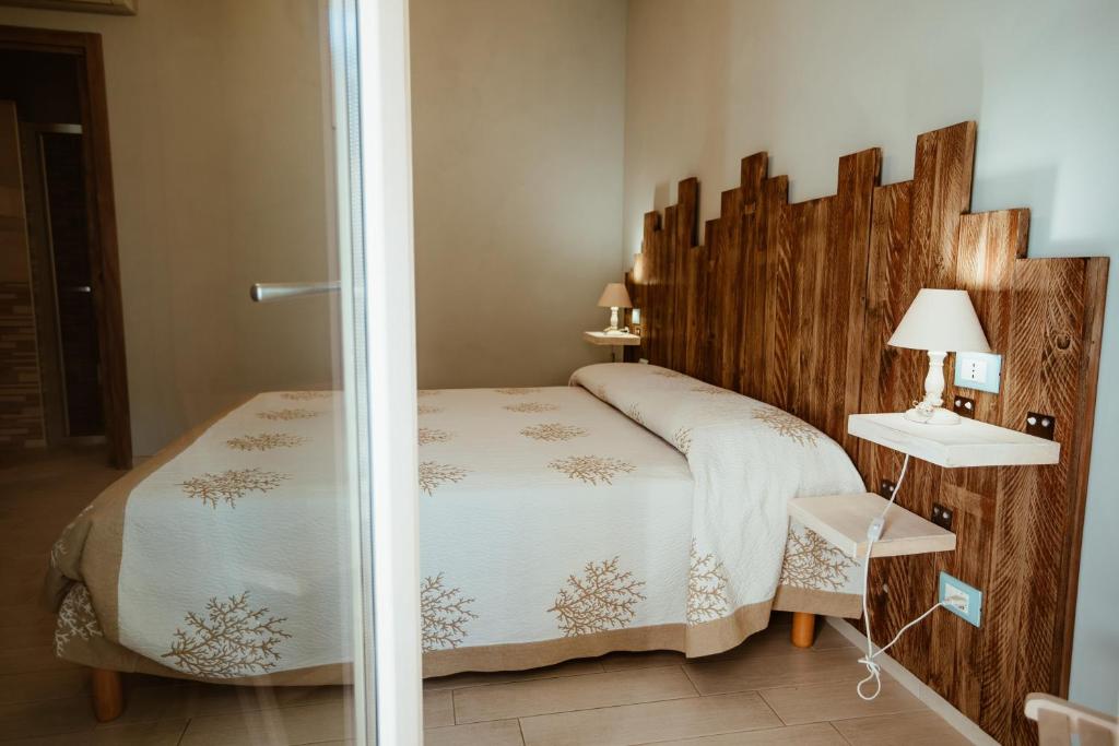 Postel nebo postele na pokoji v ubytování B&B Il Mare In Una Stanza