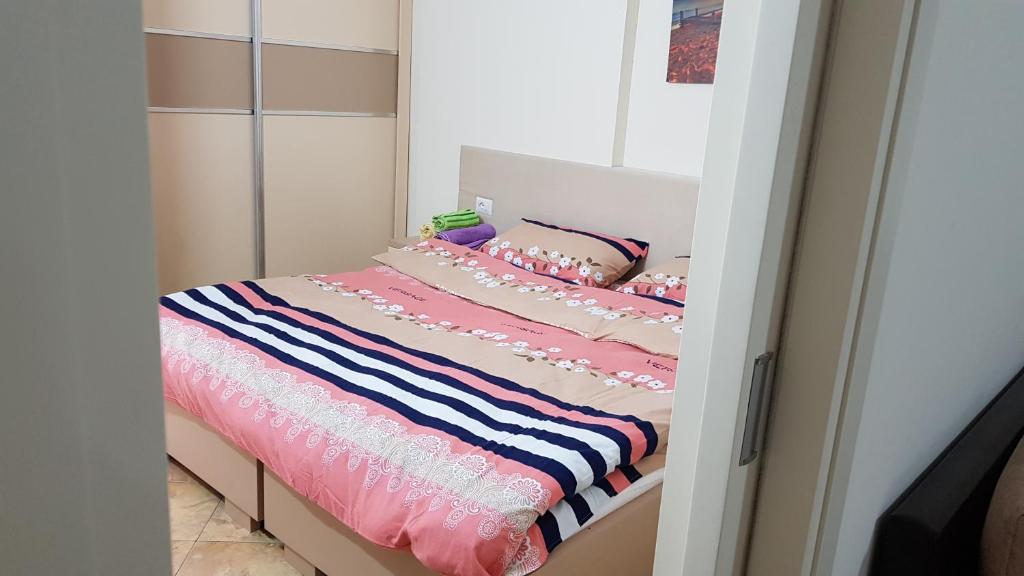 En eller flere senge i et værelse på DEA Apartment 1