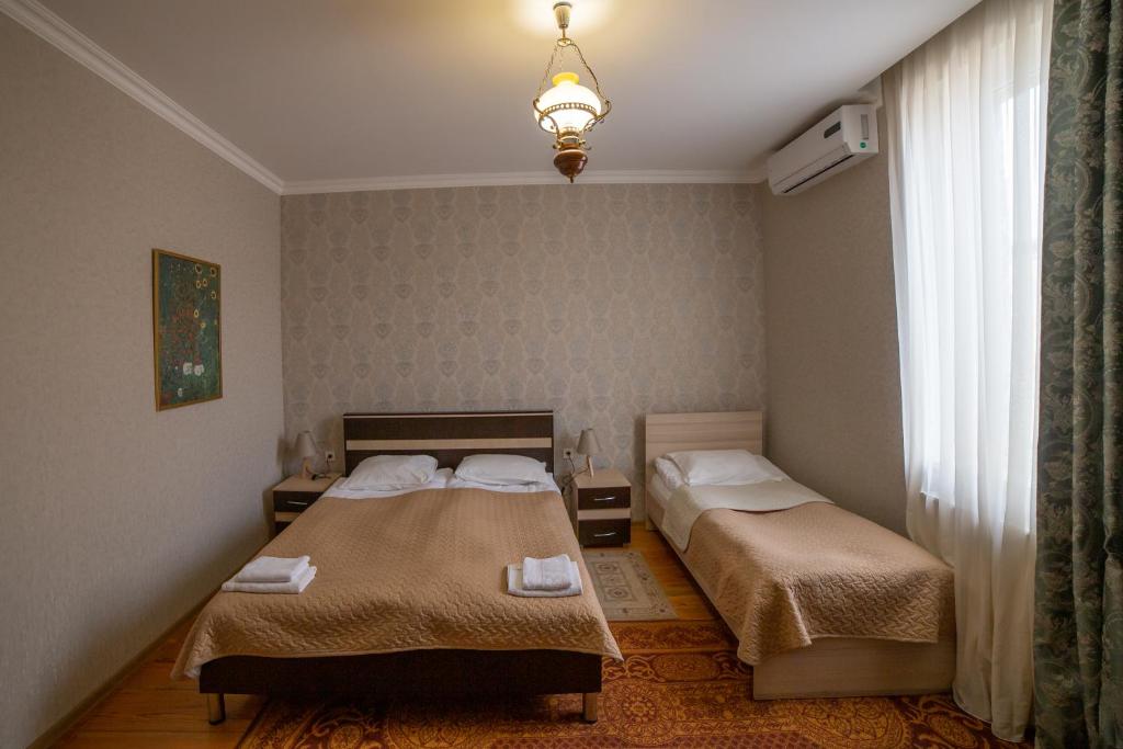 Postel nebo postele na pokoji v ubytování Savanna Guest House