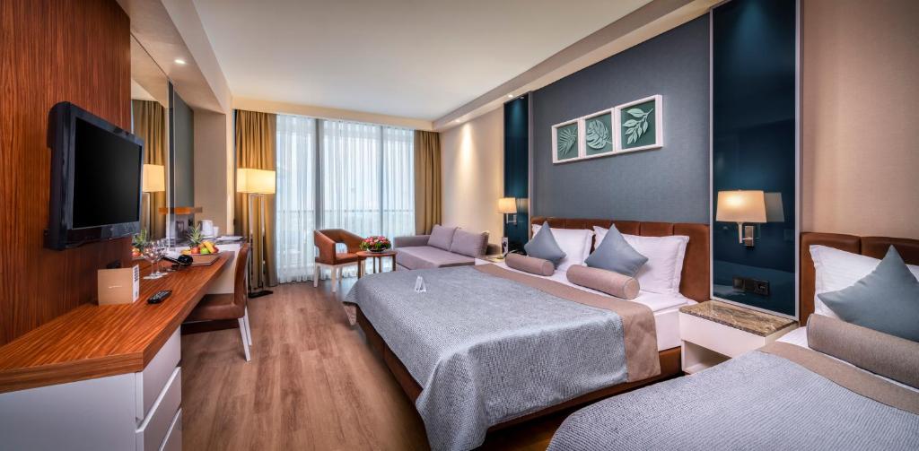 Postel nebo postele na pokoji v ubytování Baia Lara Hotel