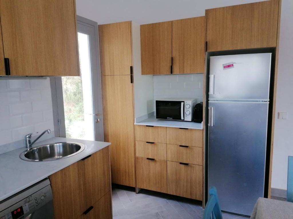A kitchen or kitchenette at Comfortable House in Formentera with Garden and Terrace