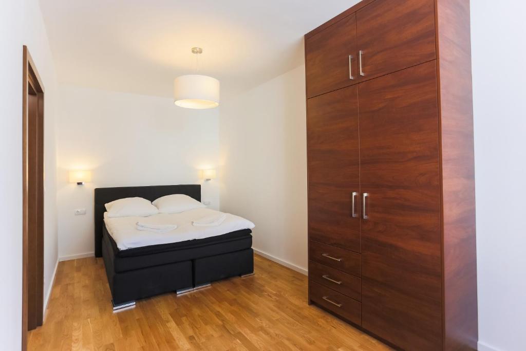 Posteľ alebo postele v izbe v ubytovaní Apartamenty Świnoujście - Rubin II