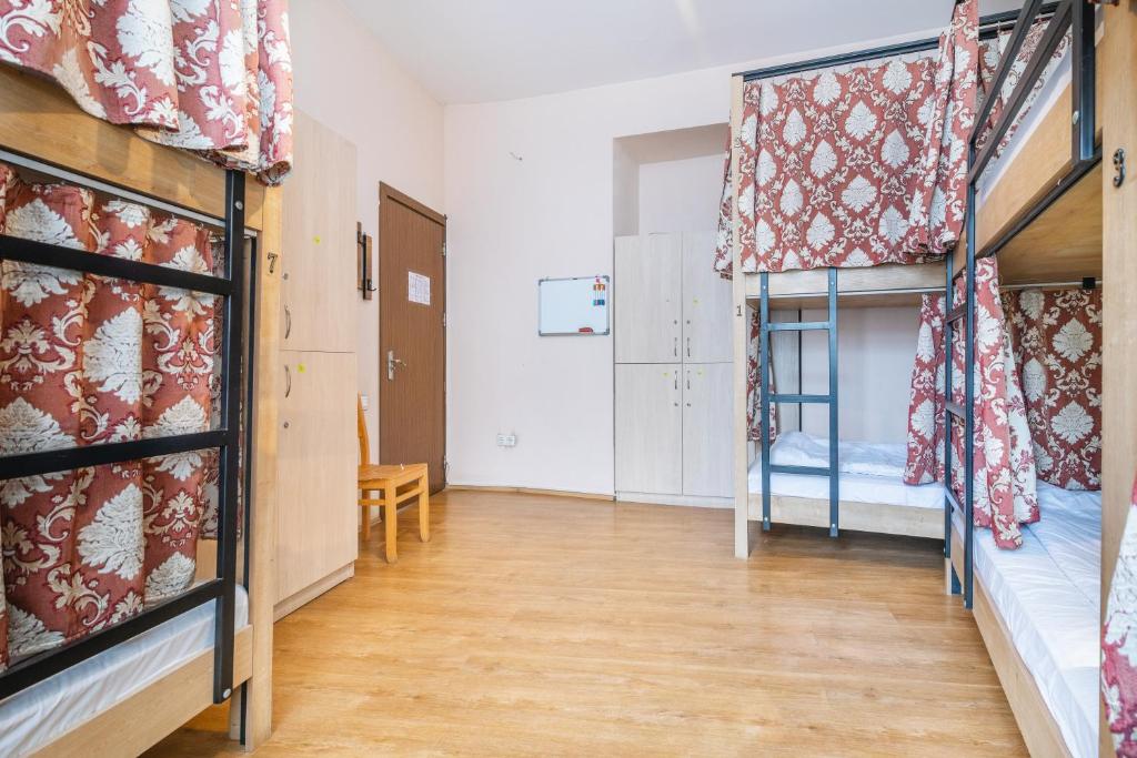 Postel nebo postele na pokoji v ubytování Pushkin 10 Hostel