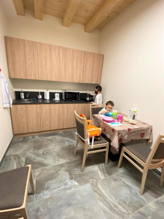 Kuchyň nebo kuchyňský kout v ubytování Livì Family Hotel