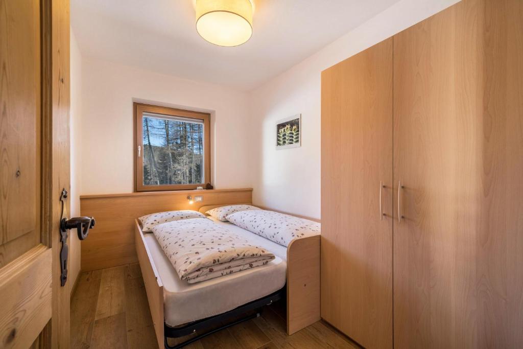 Postel nebo postele na pokoji v ubytování Ferienwohnung Ifinger Edelweiss