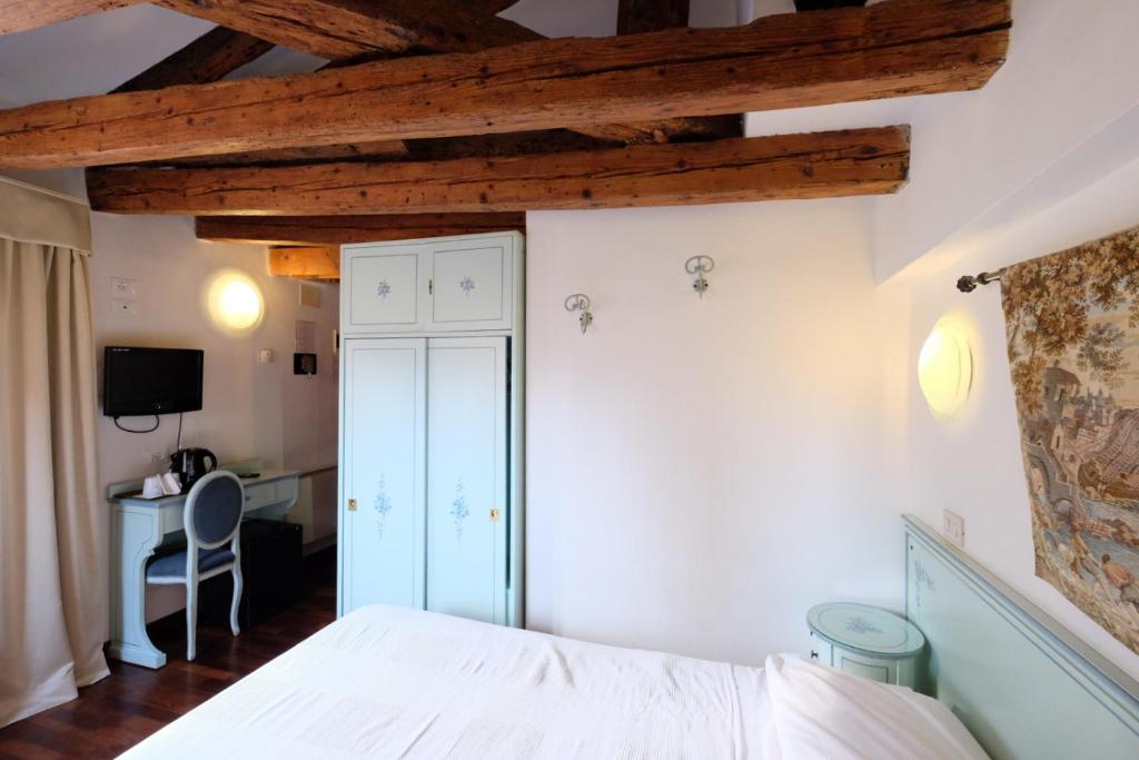 Postel nebo postele na pokoji v ubytování Hotel ai do Mori