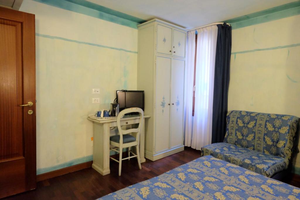 Postel nebo postele na pokoji v ubytování Hotel ai do Mori