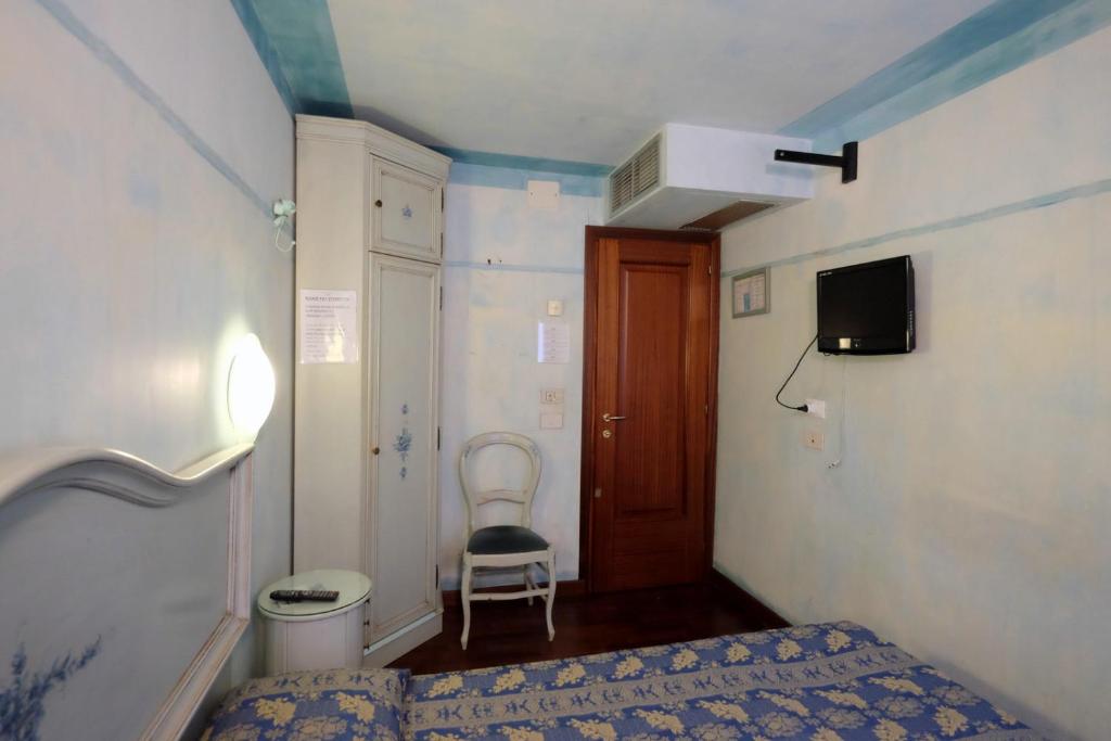 Postel nebo postele na pokoji v ubytování Hotel ai do Mori