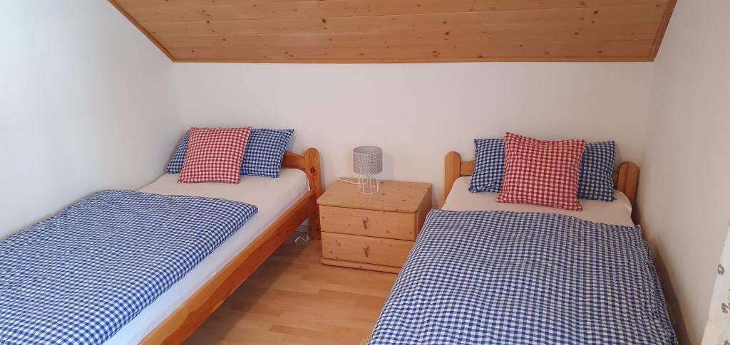 Posteľ alebo postele v izbe v ubytovaní Ferienhaus Michael