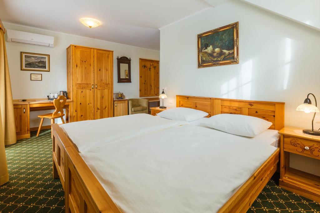 Postel nebo postele na pokoji v ubytování Penzion Kaps