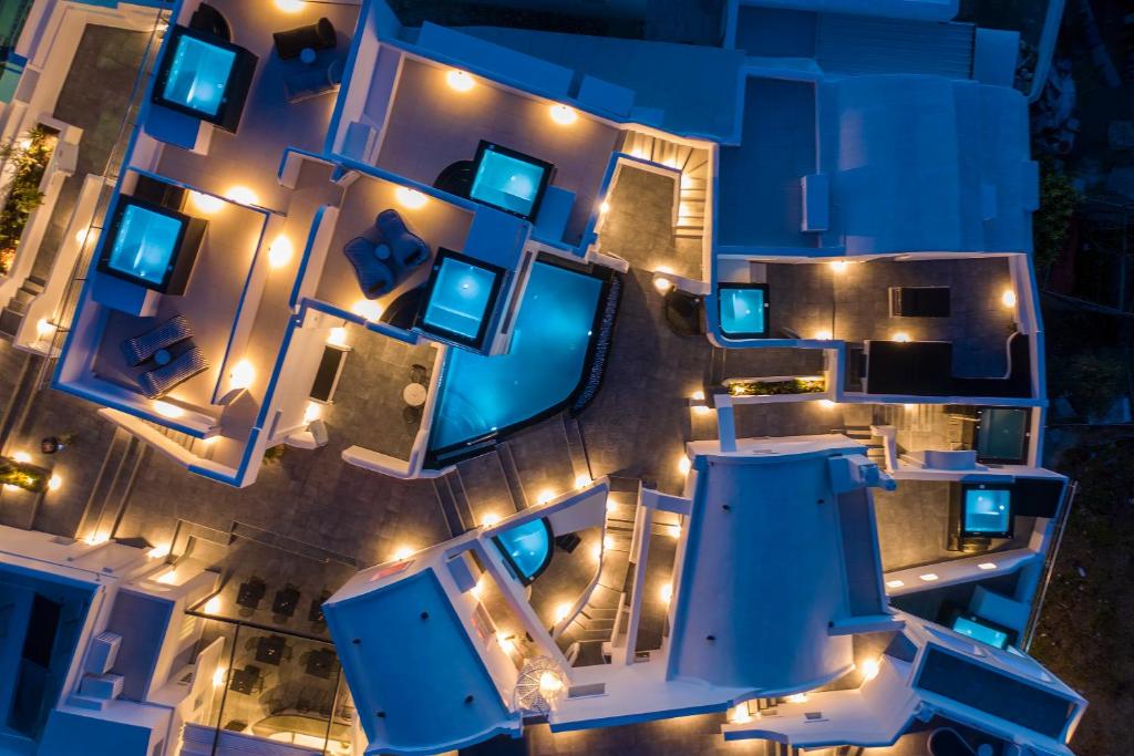 an overhead view of a building at night at Sole d'oro Luxury Suites in Oia