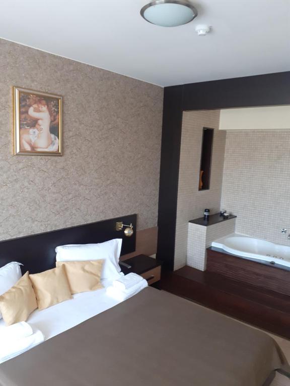 Postel nebo postele na pokoji v ubytování Hotel Nord
