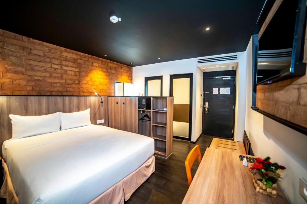 Katil atau katil-katil dalam bilik di ONOMO Hotel Douala